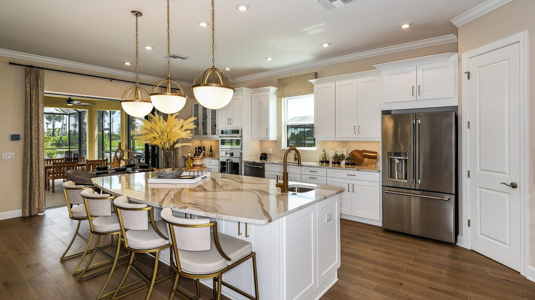 Furnished interior in a model home at Esplanade by the Islands in Naples (Image 80).