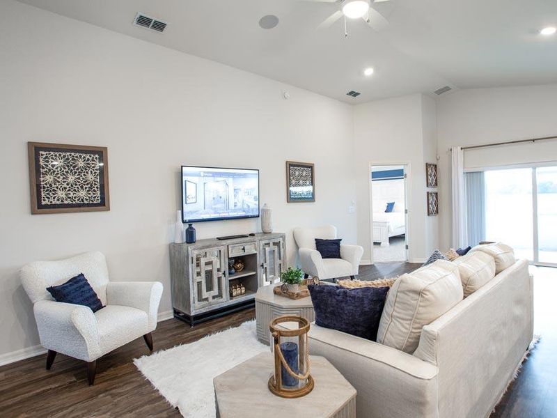 Imagine relaxing with family and friends in this spacious gathering room - Serendipity model home in Auburndale, FL