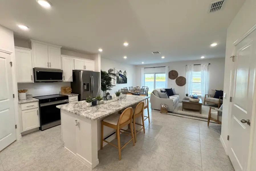 Furnished interior in a model home at Orchid Cove in Bokeelia (Image 4).