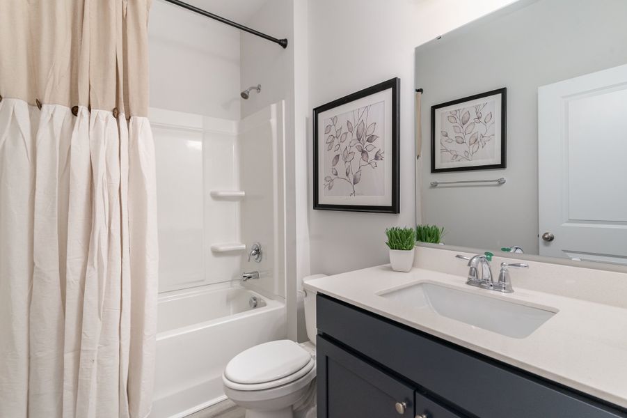 Furnished interior in a model home at Ranch Haven in Murrells Inlet (Image 19).