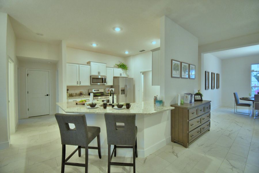 Furnished interior in a model home at The Reserve in Lakeland (Image 4).