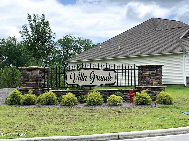 Front exterior of a home in the Villa Grande community, located in Winterville, NC (Image 1).