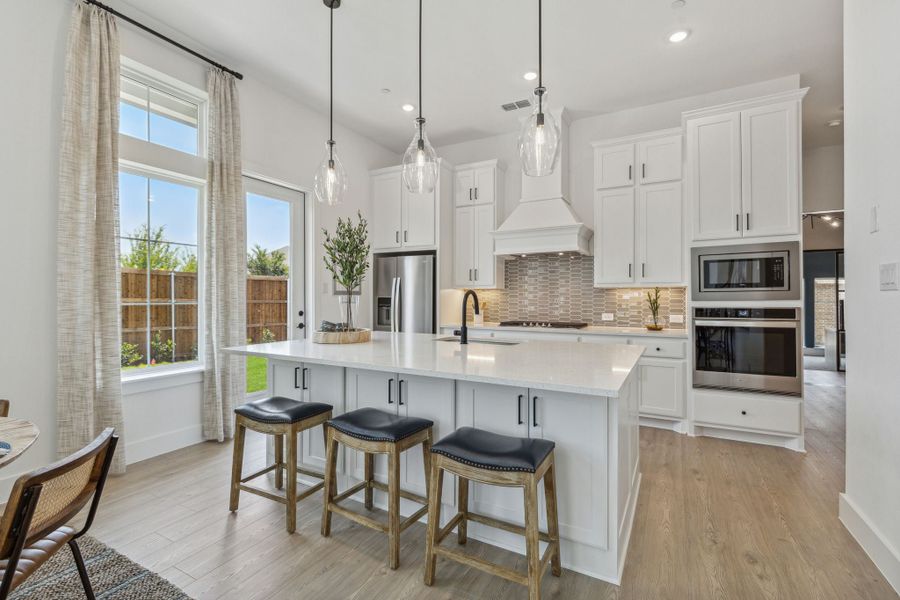 Furnished interior in a model home at Newman Village Townhomes in Frisco (Image 21).