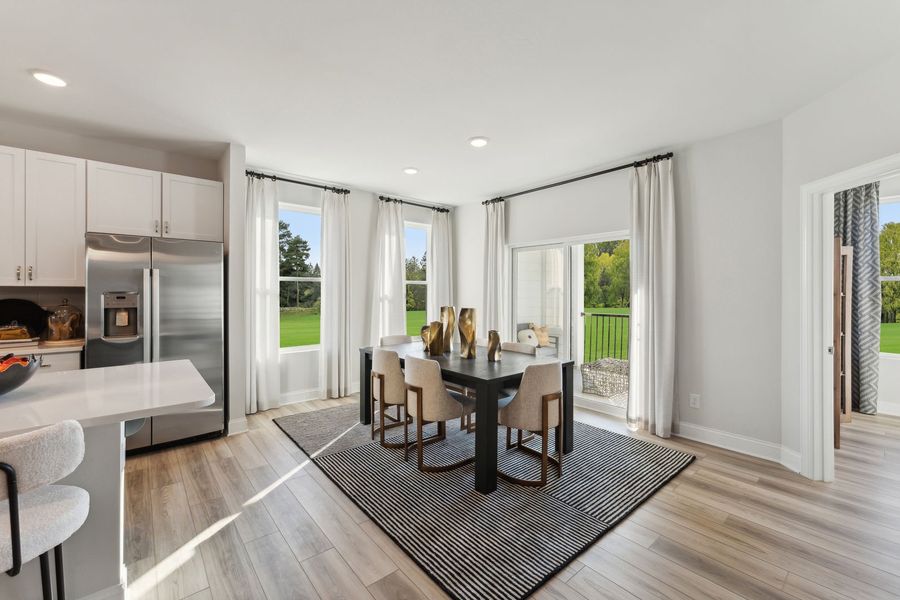 Furnished interior in a model home at Grove 98 in Wake Forest (Image 6).