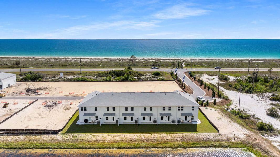 Aerial view of the WindMark Townhomes community in Port Saint Joe, FL, showing layout and nearby surroundings (Image 3).
