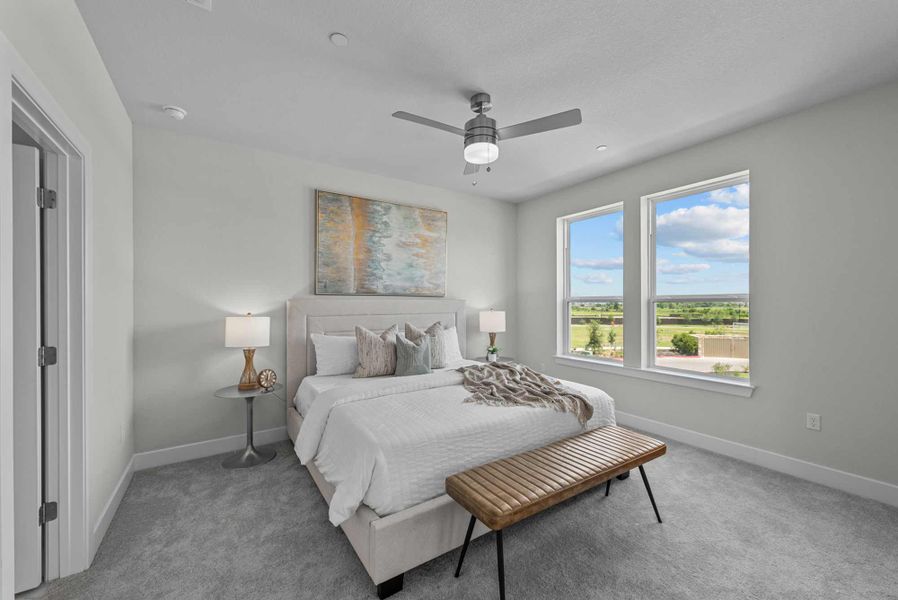 Furnished interior in a model home at Double Creek Crossing Townhomes in Round Rock (Image 9).