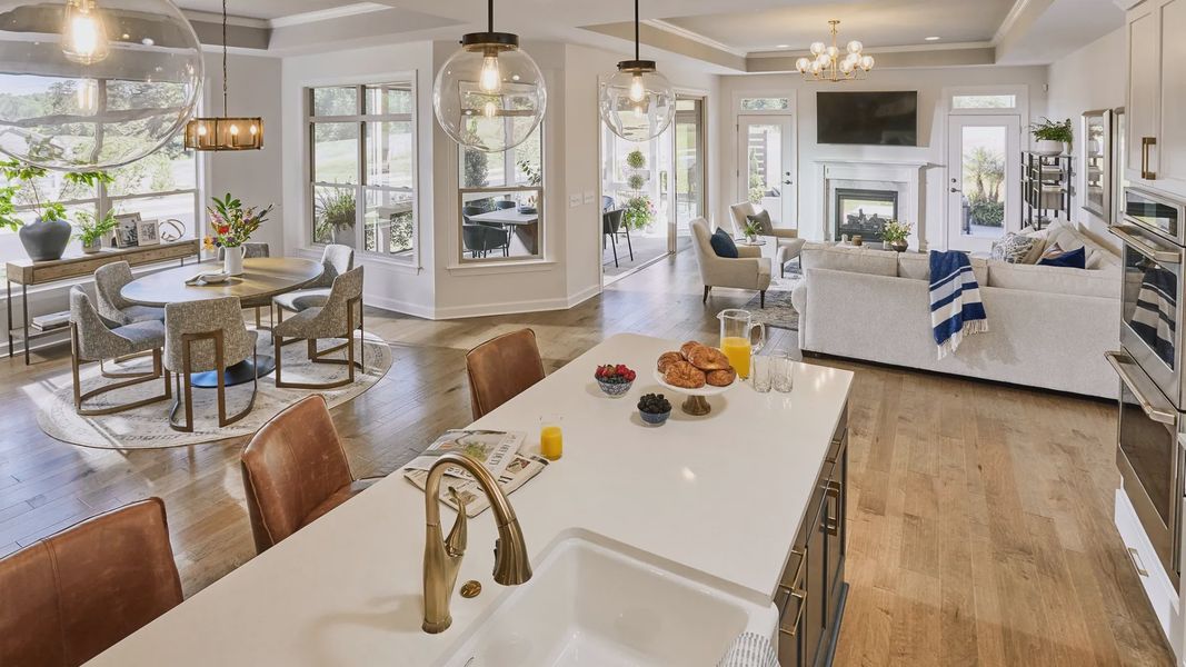 Furnished interior in a model home at The Courtyards at Holly Grove in Holly Springs (Image 5).