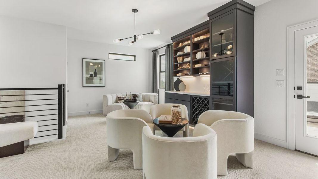 Furnished interior in a model home at Bridgeland Central in Cypress (Image 9).