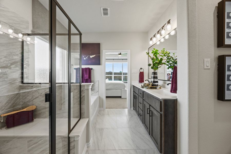 Furnished interior in a model home at El Dorado in Granbury (Image 17).