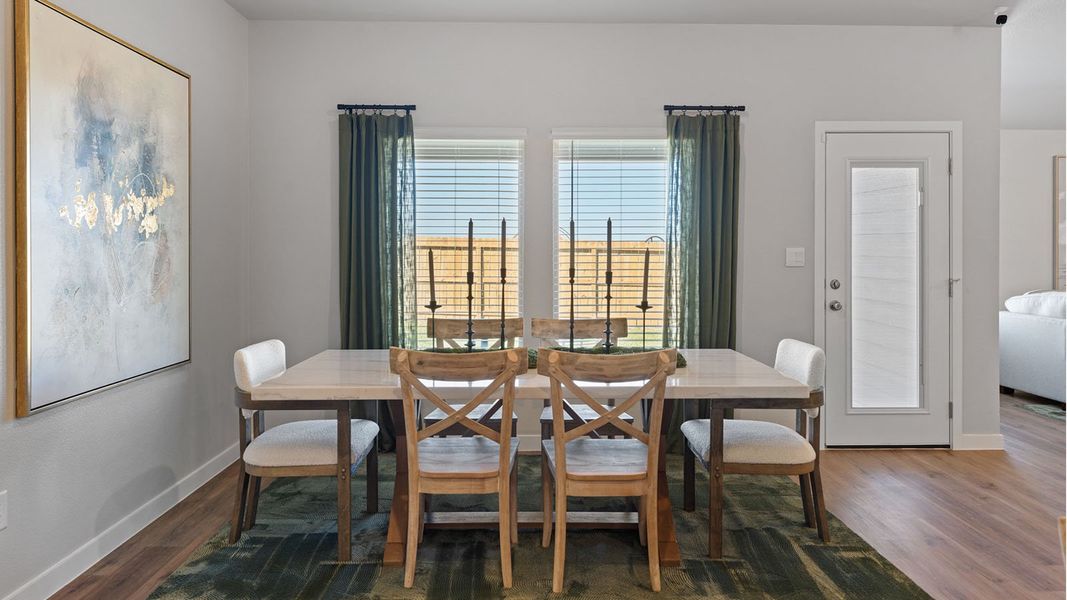 Furnished interior in a model home at King's Landing in Corpus Christi (Image 6).