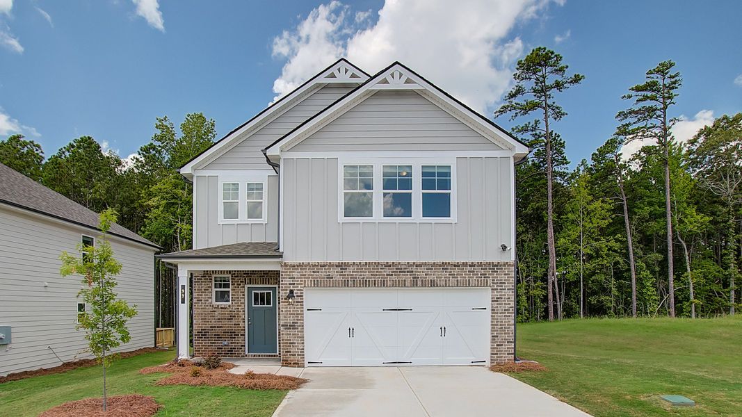 Front exterior of a home in the Enclave at Evergreen community, located in Fairburn, GA (Image 3). Front exterior of a home in the Enclave at Evergreen community, located in Fairburn, GA (Image 3).