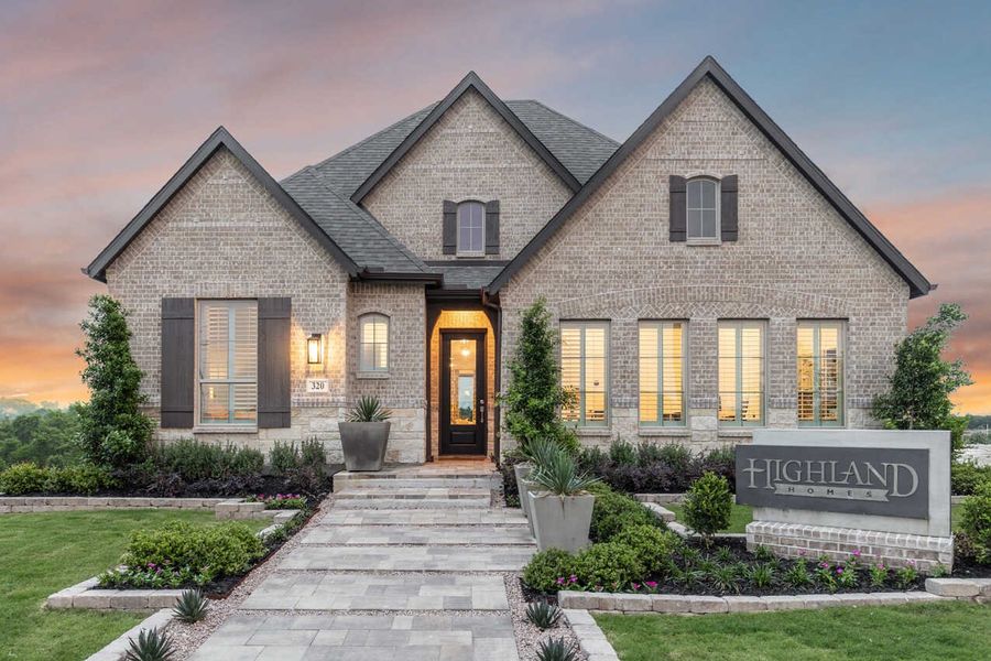 Front exterior of a home in the Venado Crossing community, located in Cibolo, TX (Image 2).