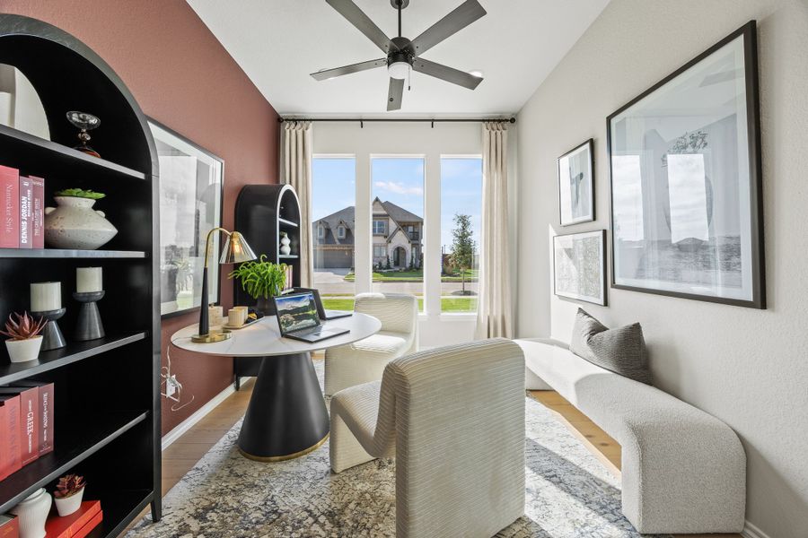 Furnished interior in a model home at El Dorado in Granbury (Image 27).