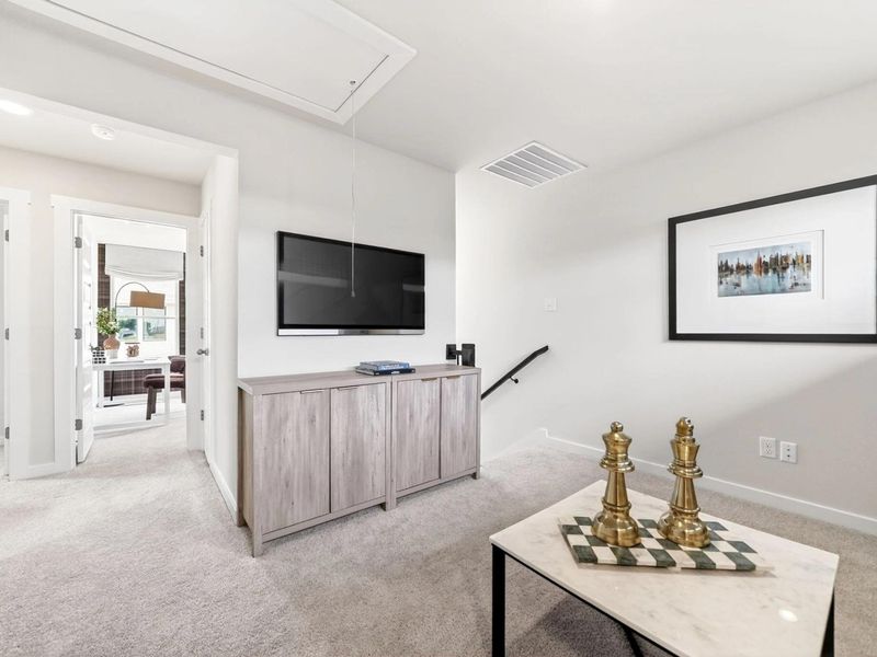 Furnished interior in a model home at Mesa Vista in San Antonio (Image 17).