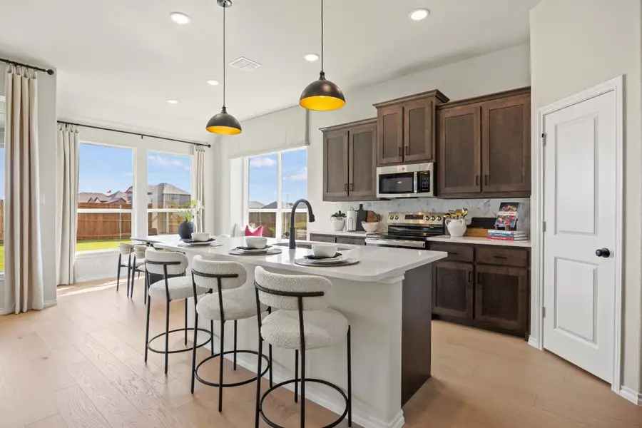 Furnished interior in a model home at El Dorado in Granbury (Image 4).