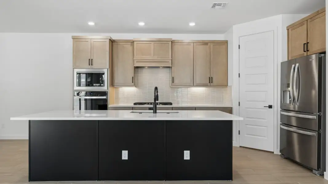 Furnished interior in a model home at Oak Park Manor Signature Homesites in Phoenix (Image 8).