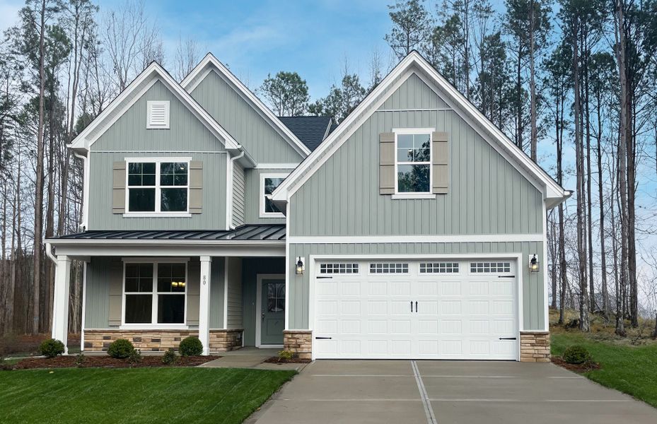 Front exterior of a home in the Magnolia Acres community, located in Fuquay Varina, NC (Image 16). Front exterior of a home in the Magnolia Acres community, located in Fuquay Varina, NC (Image 16).