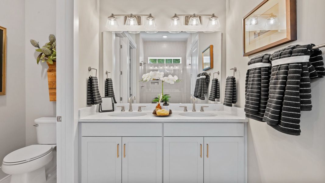 Furnished interior in a model home at Ocean Isle Palms in Shallotte (Image 8).