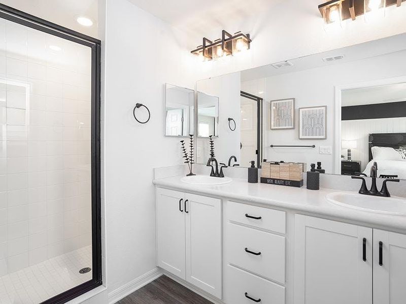 Your suite is complete with a walk-in wardrobe and a large en-suite bath - Aria model home in St. Cloud, FL Your suite is complete with a walk-in wardrobe and a large en-suite bath - Aria model home in St. Cloud, FL