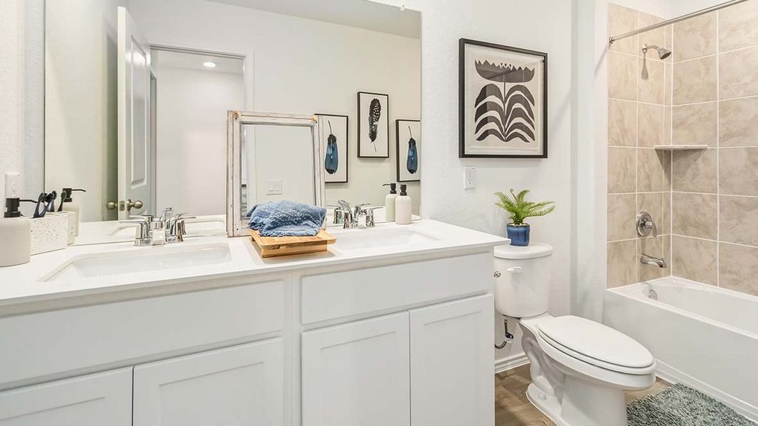 Furnished interior in a model home at Hickory Ridge in Elmendorf (Image 28).