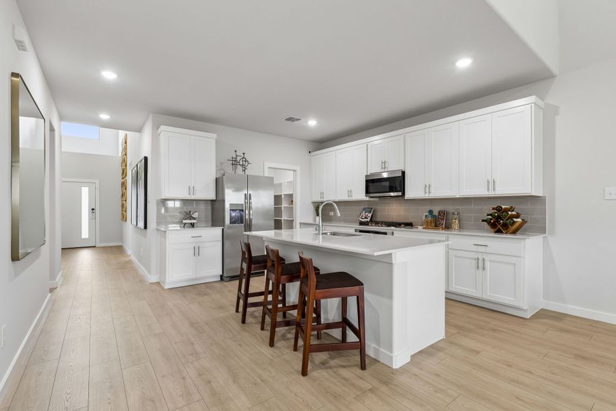 Kitchen in a Madero New Winters Model in Haslet TX by Trophy Signature Homes