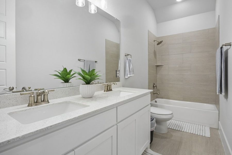 Furnished interior in a model home at Coppenger Place in Godley (Image 46).