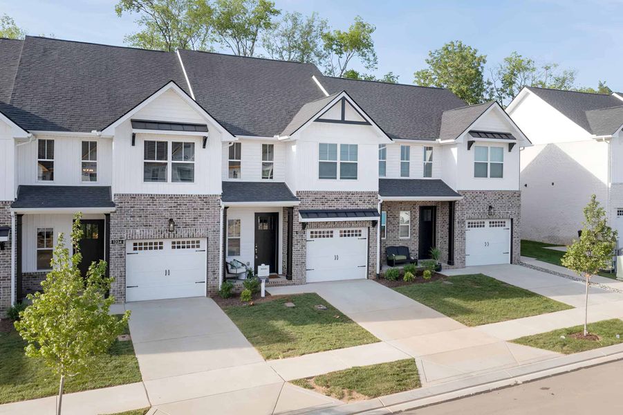 Front exterior of a home in the The Grove at Kennesaw Farms community, located in Gallatin, TN (Image 4). Front exterior of a home in the The Grove at Kennesaw Farms community, located in Gallatin, TN (Image 4).