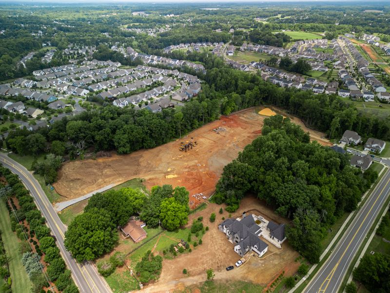 Aerial view of the Magnolia Glen community in Huntersville, NC, showing layout and nearby surroundings (Image 1). Aerial view of the Magnolia Glen community in Huntersville, NC, showing layout and nearby surroundings (Image 1).
