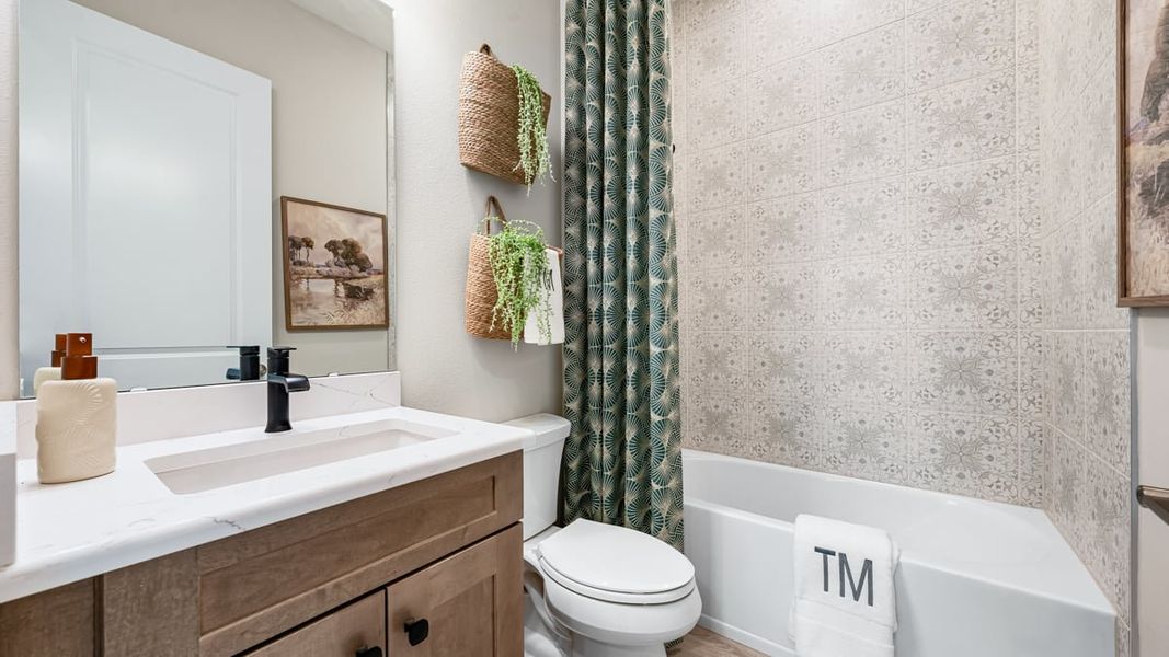 Furnished interior in a model home at Esplanade at Coasterra in Palmetto (Image 34).