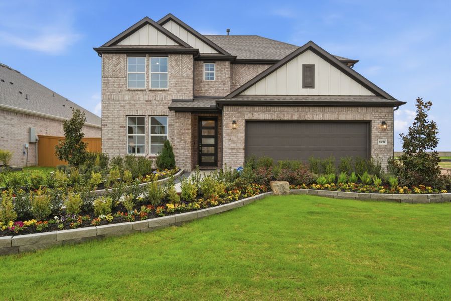 A house with a large front yard. A house with a large front yard.