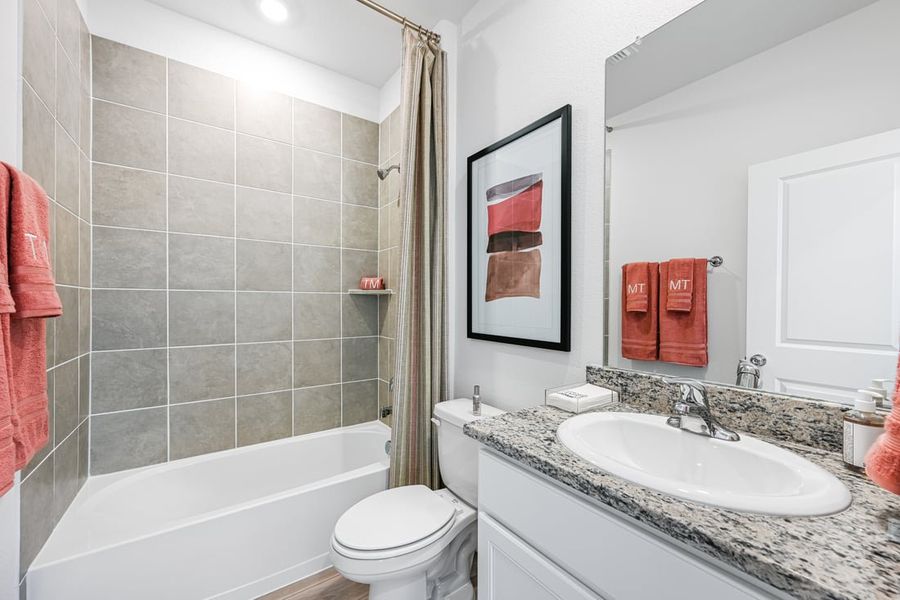 Furnished interior in a model home at River Ridge in Crandall (Image 129).