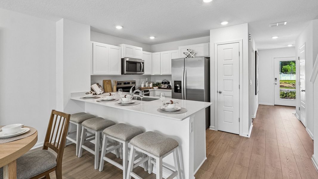 Furnished interior in a model home at Corsair in Middleburg (Image 7).