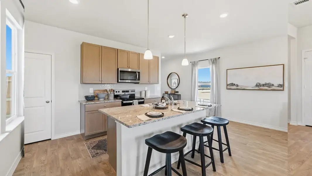 Furnished interior in a model home at Saddle Ridge Estates in Lytle (Image 11).