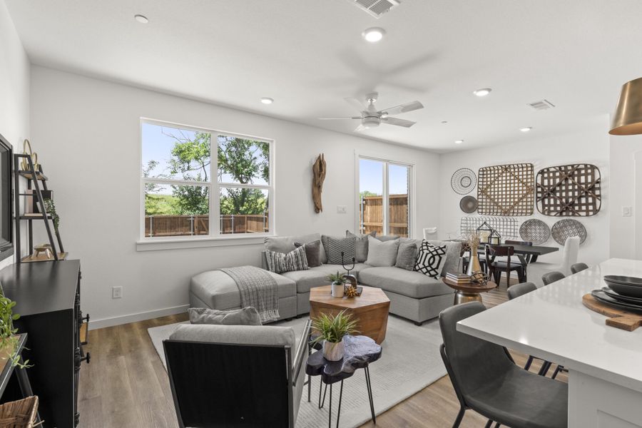 Furnished interior in a model home at Woodbridge Townhomes in Wylie (Image 8).