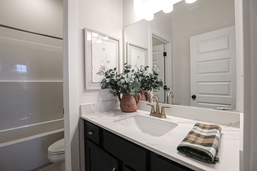 Furnished interior in a model home at Villages of Green Meadows in Munford (Image 8).