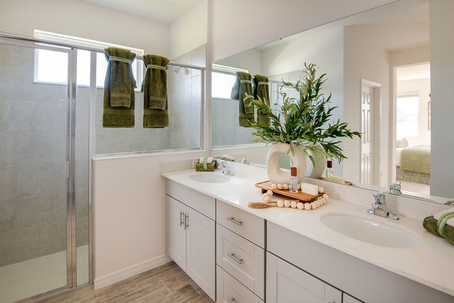 Furnished interior in a model home at Highfield at Twisted Oaks in Wildwood (Image 8).