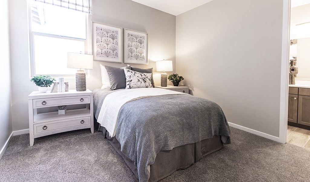 Furnished interior in a model home at Desert Bloom at Monarch in Marana (Image 14).