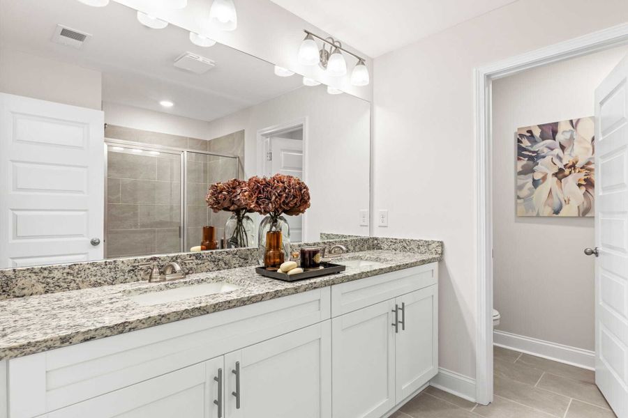 Furnished interior in a model home at Towns at Enclave in Lawrenceville (Image 48). Furnished interior in a model home at Towns at Enclave in Lawrenceville (Image 48).