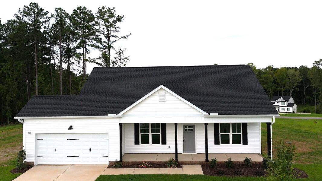 Front exterior of a home in the Riverside community, located in Zebulon, NC (Image 18). Front exterior of a home in the Riverside community, located in Zebulon, NC (Image 18).