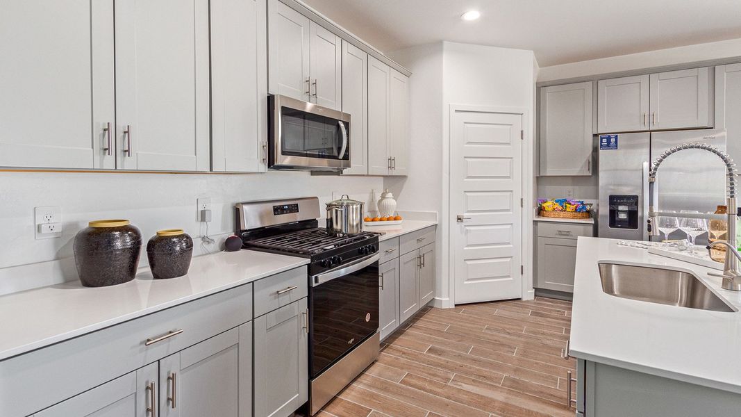 Furnished interior in a model home at Redford Estates in Tucson (Image 11).