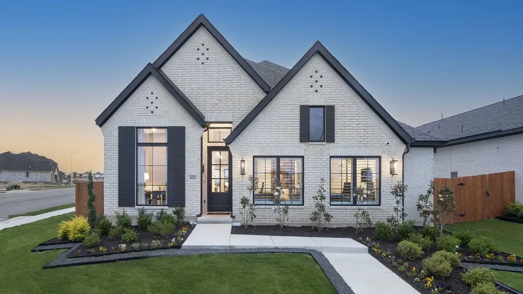 Front exterior of a home in the Lariat 45' community, located in Liberty Hill, TX (Image 2).