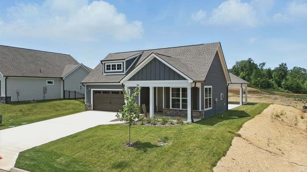 Front exterior of a home in the The Grove at Haven Hill community, located in Lenoir City, TN (Image 13). Front exterior of a home in the The Grove at Haven Hill community, located in Lenoir City, TN (Image 13).