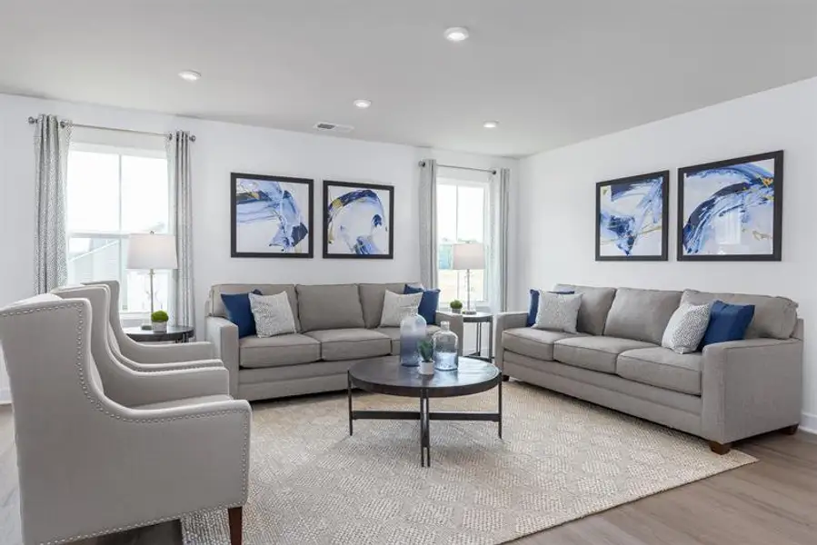 Furnished interior in a model home at Reidville Town Center Cottages in Duncan (Image 7).