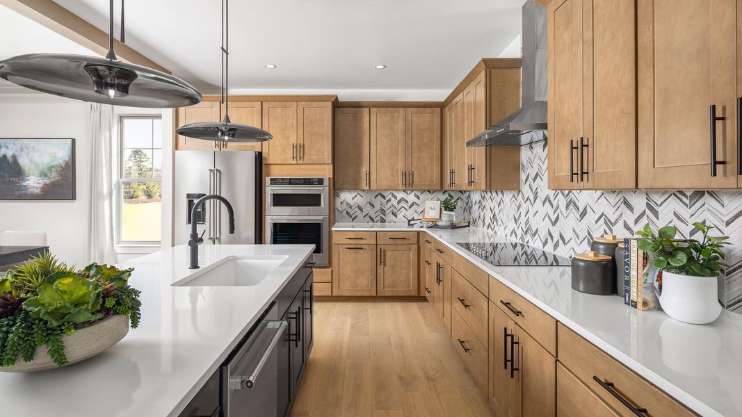 Large open kitchen with large island perfect for food prep Large open kitchen with large island perfect for food prep