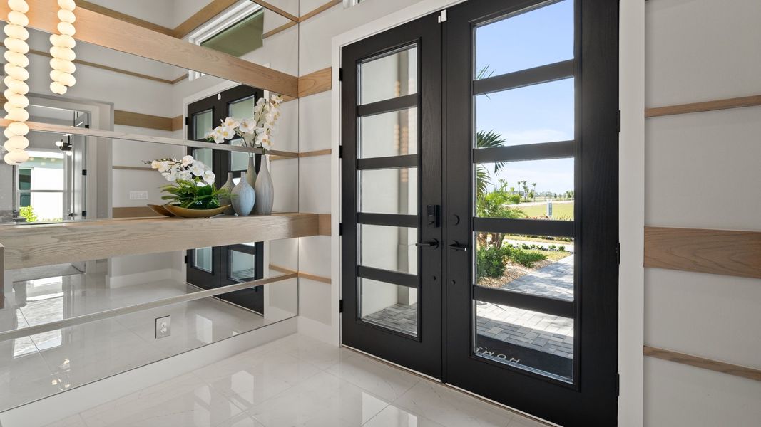 Furnished interior in a model home at Glynlea Country Club 60' in Port St. Lucie (Image 6).