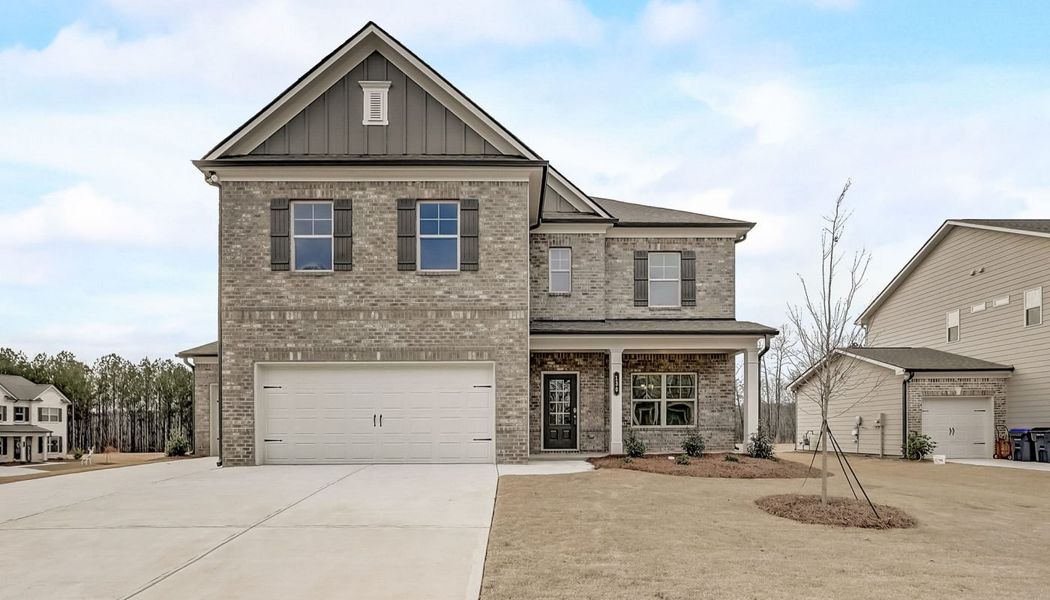 Front exterior of a home in the Pinecrest Ridge community, located in Dacula, GA (Image 18).