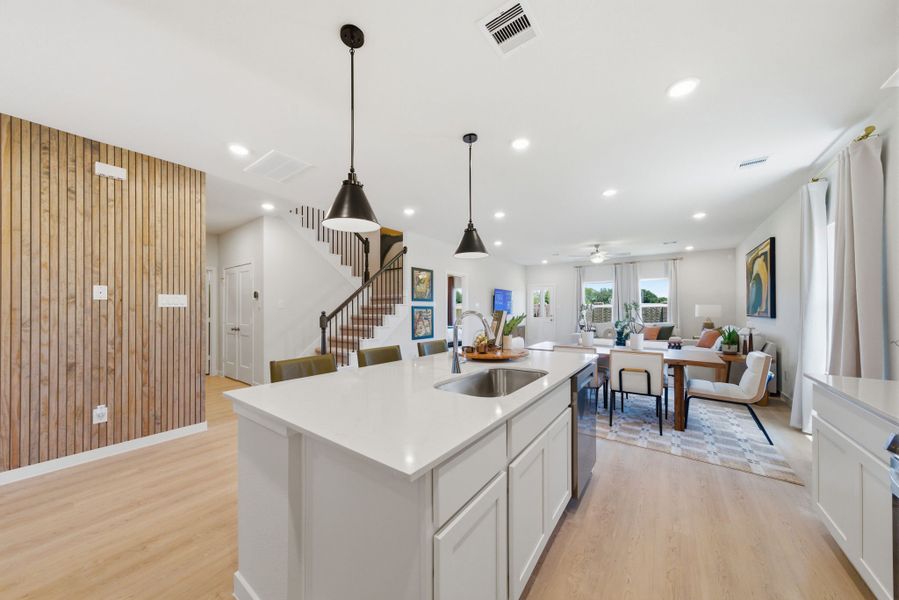 A kitchen with a large island. A kitchen with a large island.