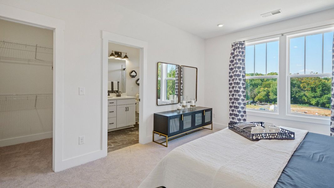 Furnished interior in a model home at Montgomery Chase in Greenville (Image 15).
