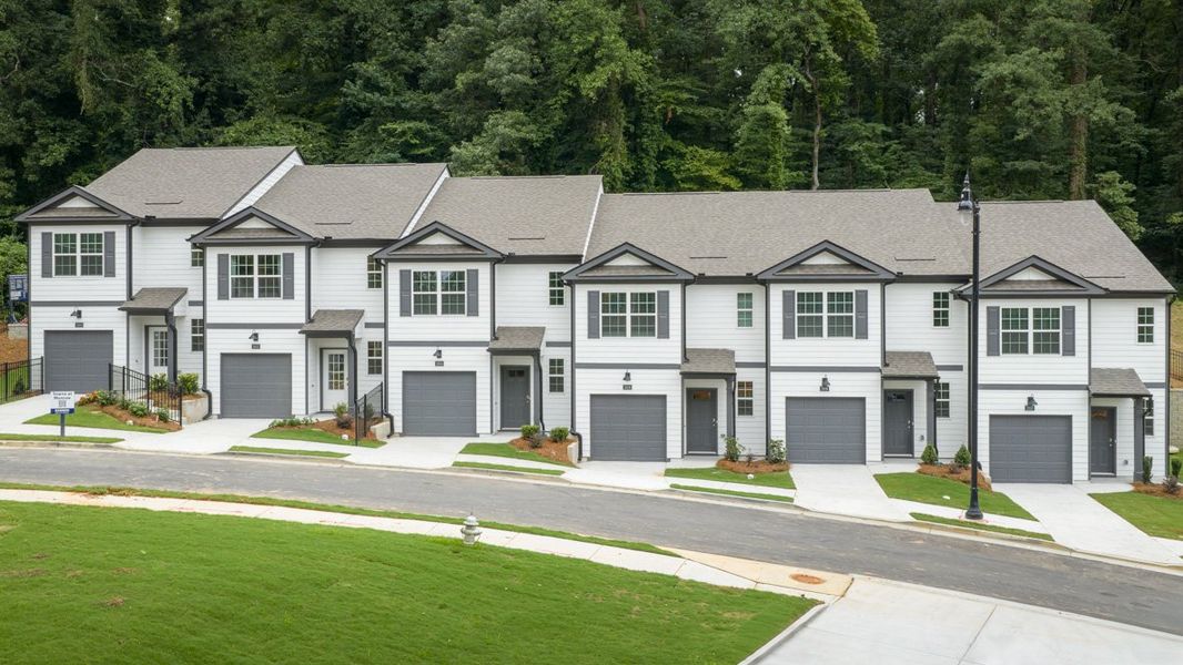 Front exterior of a home in the Wellington Park community, located in Lithonia, GA (Image 11).