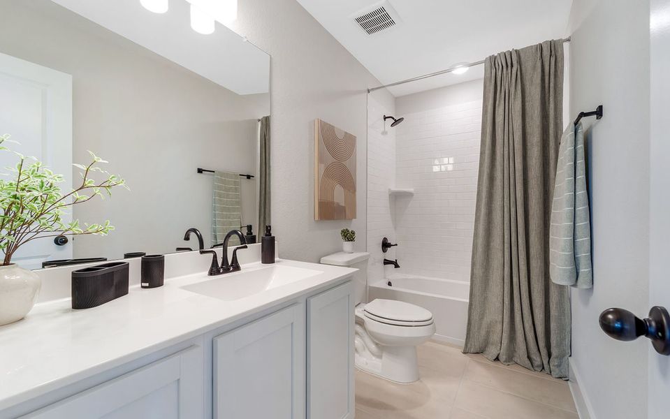 Furnished interior in a model home at Emberly in Beasley (Image 26).